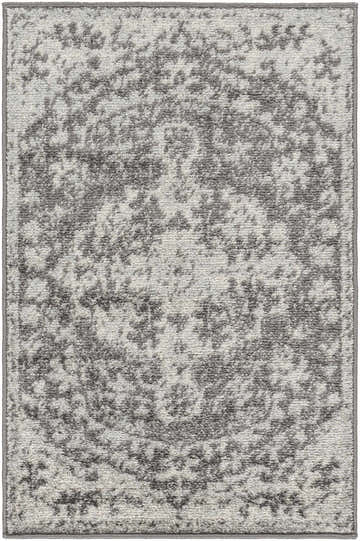 Close-up of the Everglades Area Rug. Machine-woven polypropylene rug in charcoal, gray, light beige, and medium gray. Design-Rectangle-23