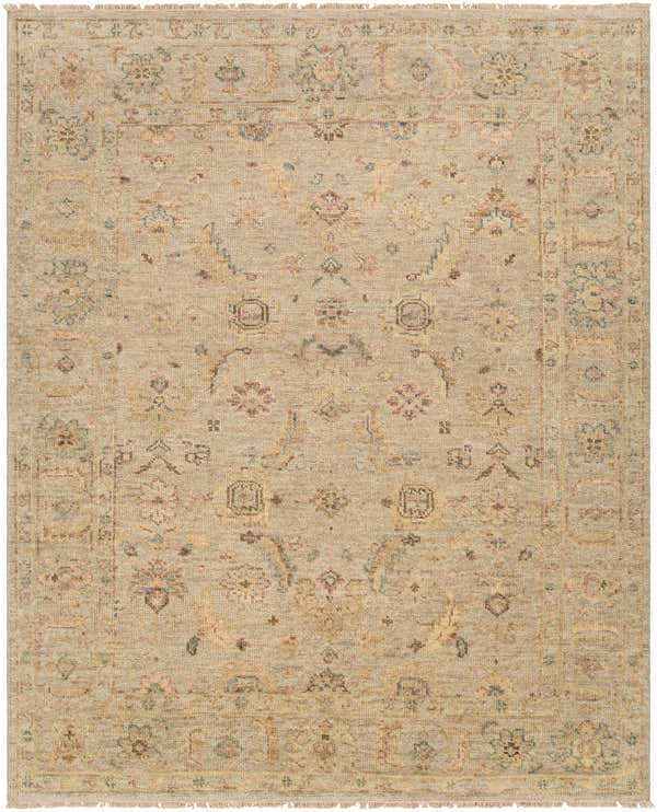 Close-up of the hand-knotted Fabre Area Rug. Beige, ivory, mauve, and gray floral pattern on wool with fringe. Design-Rectangle-810