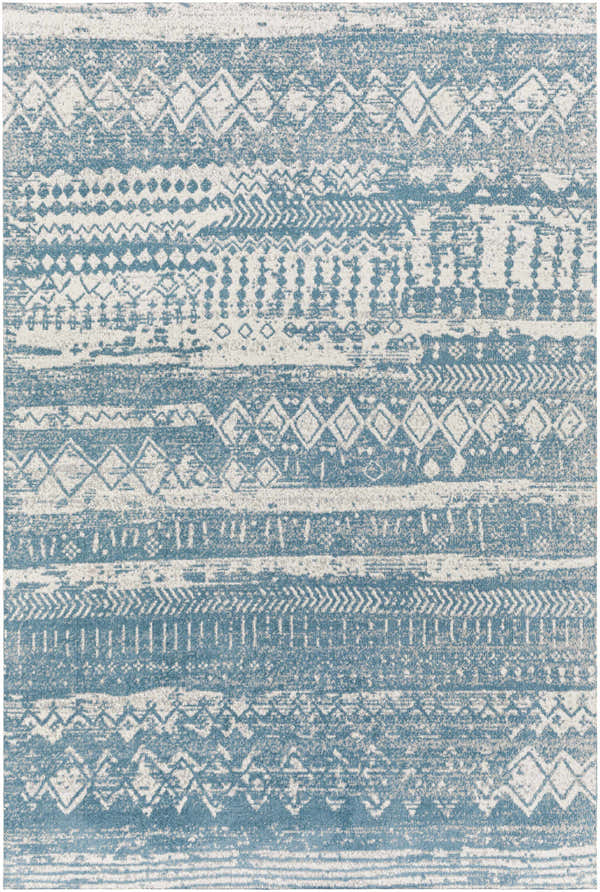 Close-up of Fatsa Washable Area Rug. Blue and gray rug with a distressed, contemporary geometric pattern. Design-Rectangle-537