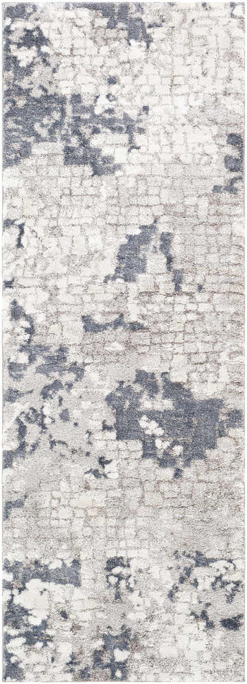 Close-up of the Fence Area Rug. Abstract pattern in denim, ivory, light gray, and medium gray. Machine woven texture. Design-Runner-2773