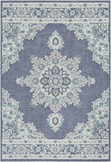Close-up of the Ferron Area Rug. Navy olefin rug with pale blue, taupe, teal, and white traditional floral pattern. Design-Rectangle-537