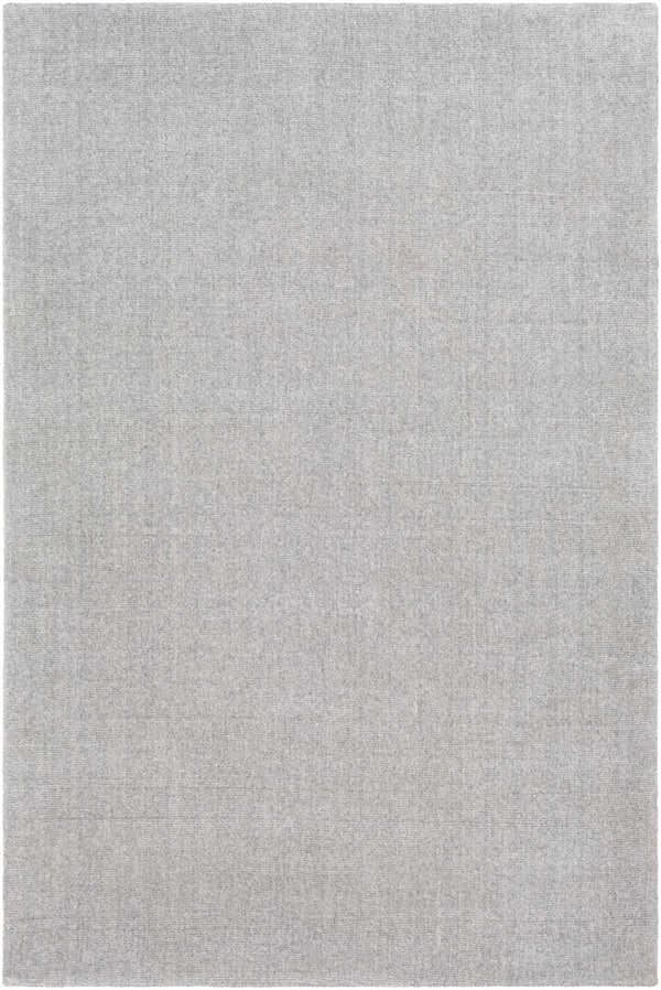 Close-up of the hand-tufted Fife Area Rug. Solid light gray wool rug with subtle striped texture. Contemporary style. Design-Rectangle-576