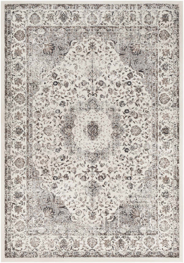 Close-up of the Finksburg Area Rug. The rug has a traditional floral pattern in camel, charcoal, dark brown, ivory, and slate. Design-Rectangle-5373