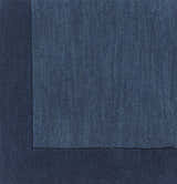 Close-up of the hand-loomed Bordered Solid Ink Blue Wool Rug, showing texture and color variations. Swatch