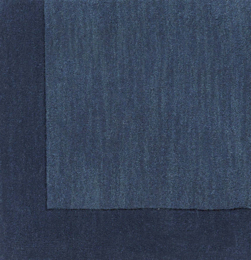 Close-up of the hand-loomed Bordered Solid Ink Blue Wool Rug, showing texture and color variations. Swatch