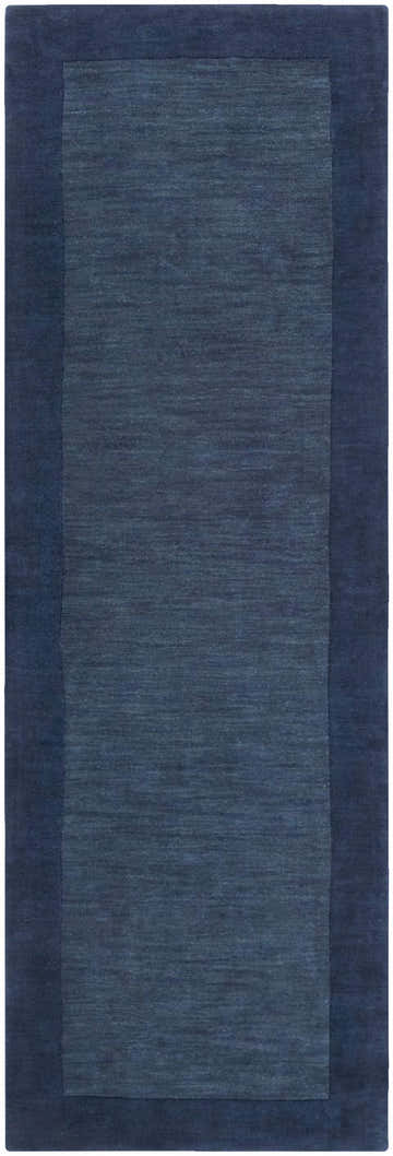 Close-up of the Bordered Solid Ink Blue Wool Rug. Hand-loomed rug with a solid ink blue center and a darker blue border. Design-Runner-268