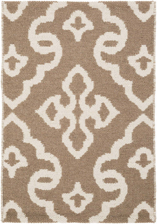 Close-up of the Fitzpatrick Reversible Area Carpet, showcasing its cream and medium brown bohemian-inspired pattern and hand-woven texture. Design-Rectangle-23