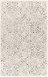 Close-up of the Flatlands Area Rug. Hand-tufted wool rug in cream and charcoal with geometric and floral medallion pattern. Design-Rectangle-576
