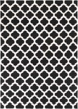 Close-up of the Fleetville Area Rug. Black and ivory wool rug with a geometric quatrefoil pattern. Hand woven rug texture. Design-Rectangle-811