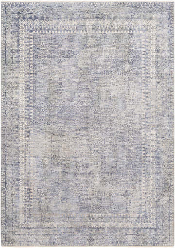 Close-up of Foley Carved Statement Rug. Machine-woven polyester rug in blue, sage, and gray with a traditional pattern. Design-Rectangle-582