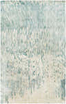 Close-up of the Fonda Area Rug. Hand-knotted wool rug in blue, gray, and taupe with a contemporary abstract pattern. Design-Rectangle-58