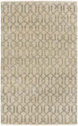 Close-up of the Fairborn Wool Rug. Hand-knotted rug in charcoal and taupe with a geometric linked pattern. Design-Rectangle