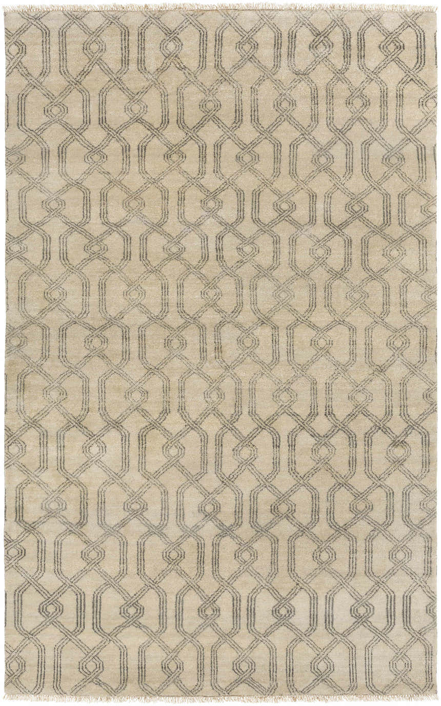 Close-up of the Fairborn Wool Rug. Hand-knotted rug in charcoal and taupe with a geometric linked pattern. Design-Rectangle