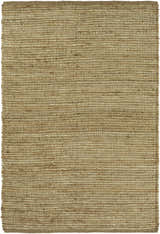 Close-up of the hand woven Frederic Jute Carpet. Tan and grass green jute fibers create a textured, rectangular rug. Design-Rectangle-576