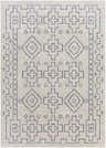 Close-up of the Fernway Indoor & Outdoor Rug. The rug features a geometric pattern in navy blue on an off-white background. Design-Rectangle-537