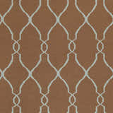 Close-up of the Frost Area Rug. Brown wool rug with a dusty sage, geometric lattice pattern. Swatch