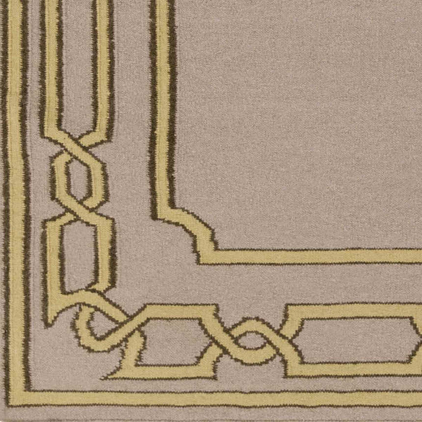 Close-up of the Fruitvale Area Rug, a hand-woven wool rug with a geometric dark brown and tan border on a taupe field. Swatch