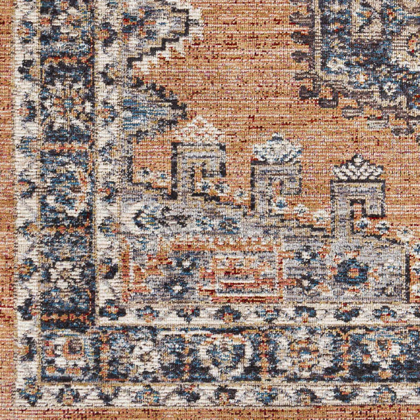 Close-up of the Fullarton Performance Rug showing the beige, blue, and red traditional-style pattern. Swatch