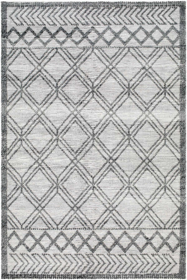 Close-up of the Gada Area Rug. Hand-woven rug with a geometric diamond pattern in dark gray and light gray. Design-Rectangle-576
