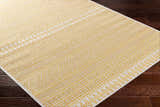 Close-up of Galal Area Rug; beige and gold geometric pattern on a machine woven, 100% Polypropylene rug. Corner