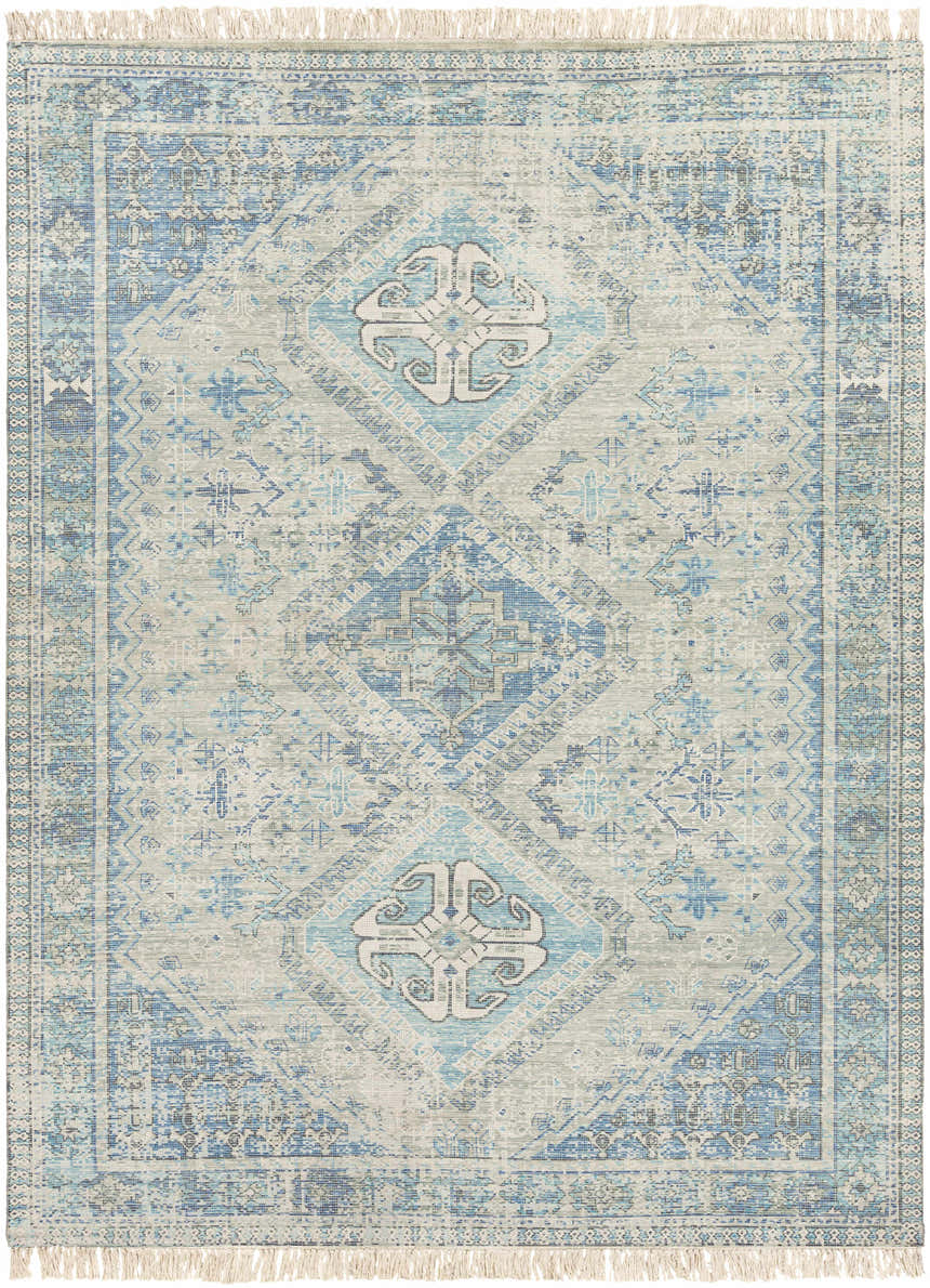 Close-up of Galgate Area Rug. Hand-woven cotton rug in aqua, teal, and sage with traditional diamond and geometric patterns. Design-Rectangle-810