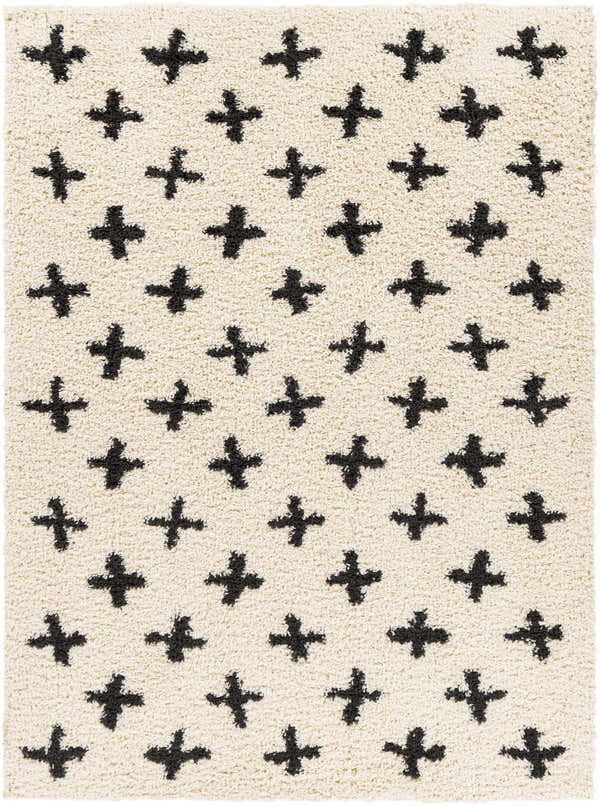 Close-up of the Gambo Area Rug. Cream shag rug with a black plus sign pattern. Moroccan style. Design-Rectangle-537