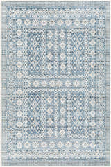 Close-up of Gandy Washable Area Rug in blue and cream, featuring a contemporary geometric pattern and farmhouse style. Design-Rectangle-537