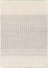 Close-up of the hand-woven Garbutt Area Carpet. Light beige and medium gray geometric patterns add texture and a bohemian vibe. Design-Rectangle-576