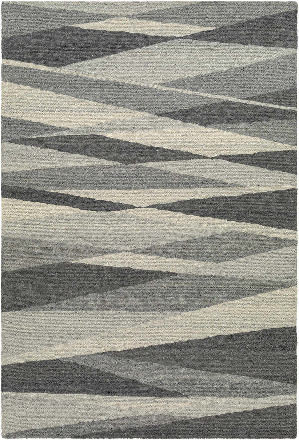 Close-up of the Garlands Area Rug. Hand-tufted wool rug in black, charcoal, gray, and light gray with a contemporary, geometric pattern. Design-Rectangle-913