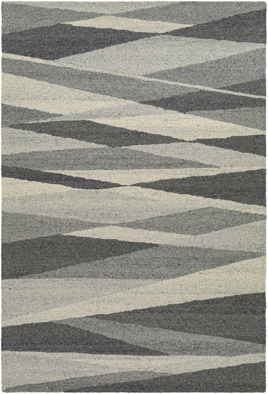 Close-up of the Garlands Area Rug. Hand-tufted wool rug in black, charcoal, gray, and light gray with a contemporary, geometric pattern. Design-Rectangle-913
