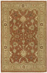 Close-up of the Gatzke Area Rug. Hand-knotted wool rug in camel, dark brown, off-white, and tan with a traditional floral pattern. Design-Rectangle-5686