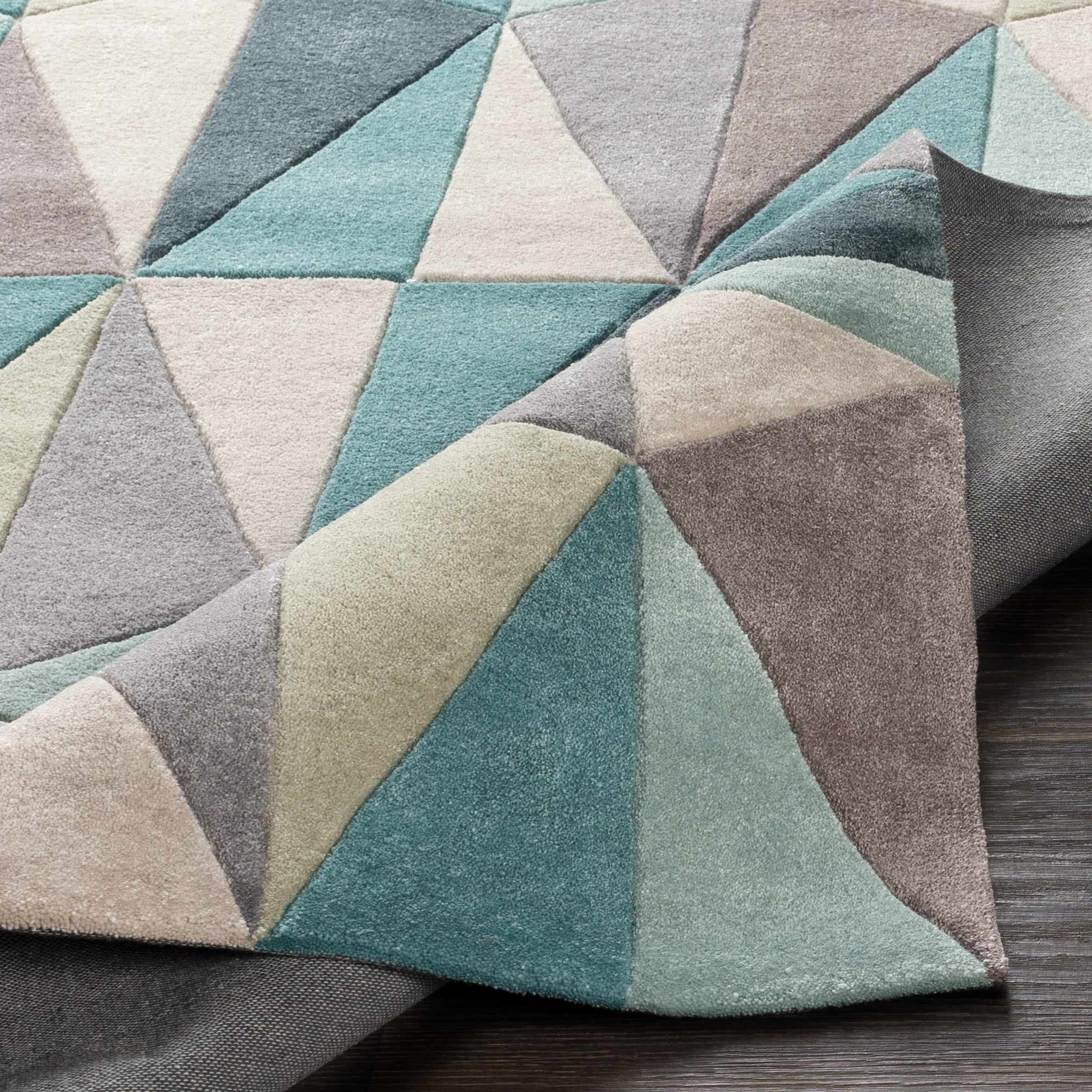 Folded section of Gifford Area Rug - Clearance, displaying material thickness and weave. Contemporary Area Rug Backing Canvas 