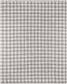 Close-up of the Garth Ivory Wool Rug, featuring a classic gray and white woven gingham check pattern. Design-Rectangle-810