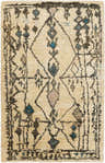 Close-up of the Glide Premium Jute Rug. Hand-knotted rug with a beige backdrop and aqua, blue, and tan geometric patterns. Design-Rectangle-69
