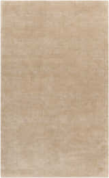 Close-up of the Galata Area Rug, a solid, hand-loomed rectangle rug in a soft beige hue, made of wool and viscose. Design-Rectangle