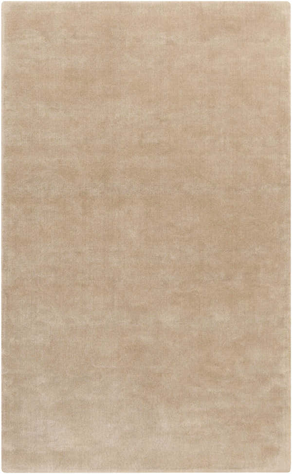 Close-up of the Galata Area Rug, a solid, hand-loomed rectangle rug in a soft beige hue, made of wool and viscose. Design-Rectangle