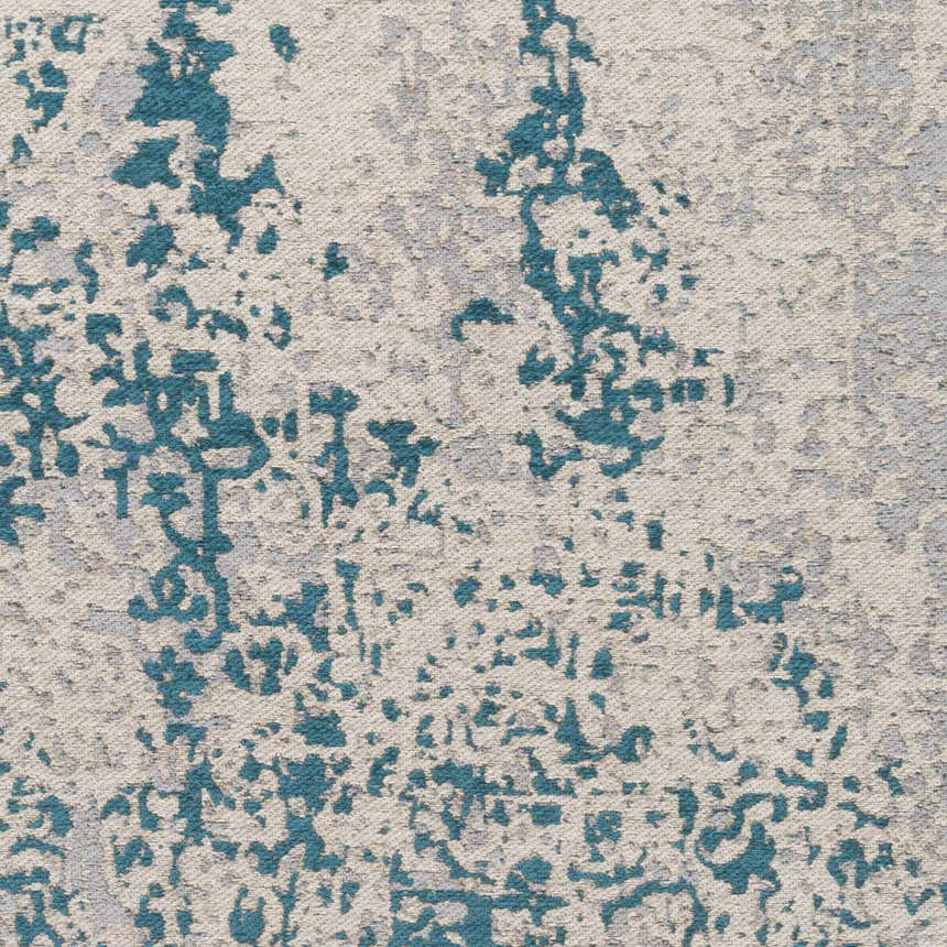 Close-up of Sweeny Beige/Blue Abstract Area Rug. Features teal, slate, and ivory hues in a contemporary pattern. Swatch