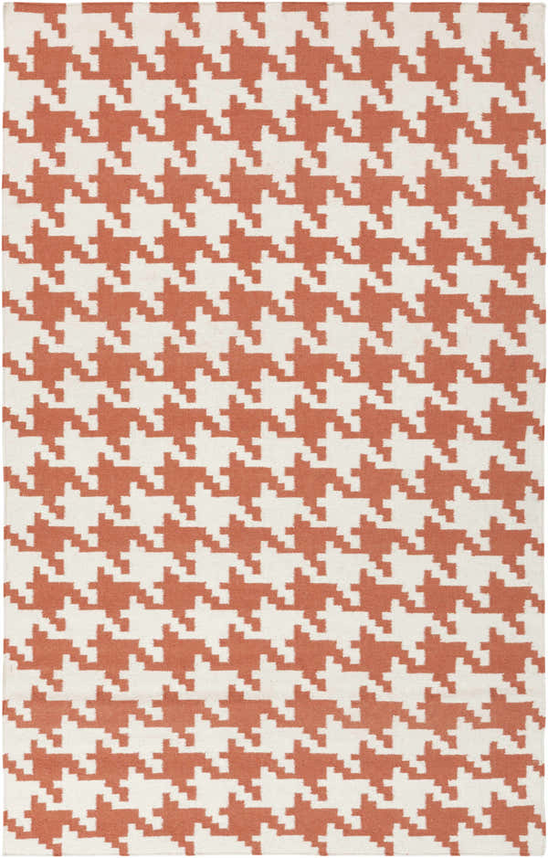 Close-up of the hand woven Goldthwaite Area Rug. Burnt orange and light beige houndstooth pattern. Design-Rectangle-58