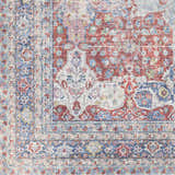 Close-up of the Rust Goma Vintage Area Rug showing its brick red, blush, and blue traditional floral pattern. Swatch