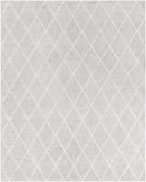 Close-up of the Gonvick Area Rug. Light gray viscose rug with a subtle off-white diamond pattern. Hand-knotted texture. Design-Rectangle-810