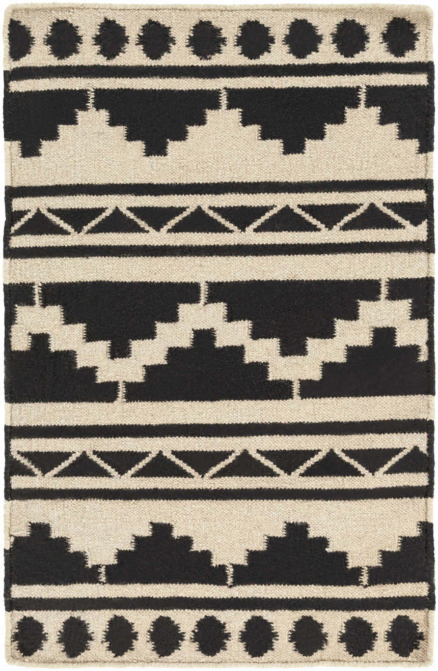 Close-up of the Gratiot Area Rug. Black geometric patterns on a medium gray, hand woven rug. Perfect for bathroom, kitchen, or mudroom. Design-Rectangle-23