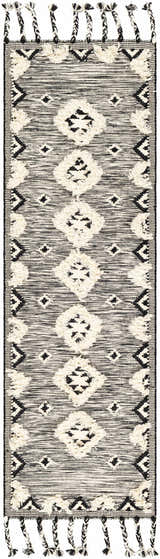 Close-up of the Gardner Cream on Gray Wool Tassel Rug, featuring a geometric pattern and tasseled edges. Design-Runner-268