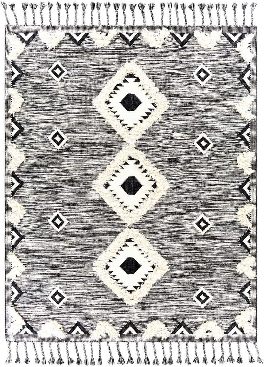 Close-up of the Gardner Cream on Gray Wool Tassel Rug, featuring a geometric pattern and fringe tassels. Design-Rectangle-810