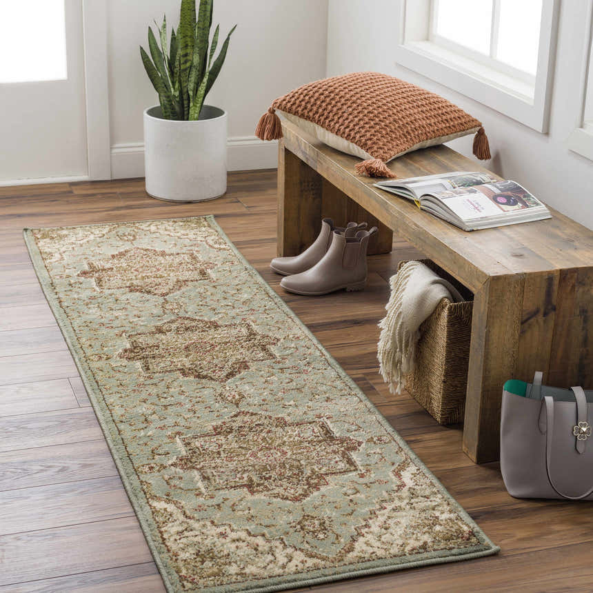 Entryway with Granger Area Rug runner in sage, burgundy, and beige. Rustic bench, wood floors, and natural light. Roomscene-Runner
