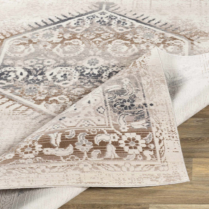Close-up of the Hainesville White Medallion 10' Runner Rug showing its traditional medallion pattern and neutral beige, brown, and gray tones. Fold