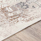 Close-up of Hainesville White Medallion 10' Runner Rug. Farmhouse style rug with neutral tones and traditional medallion pattern. Texture