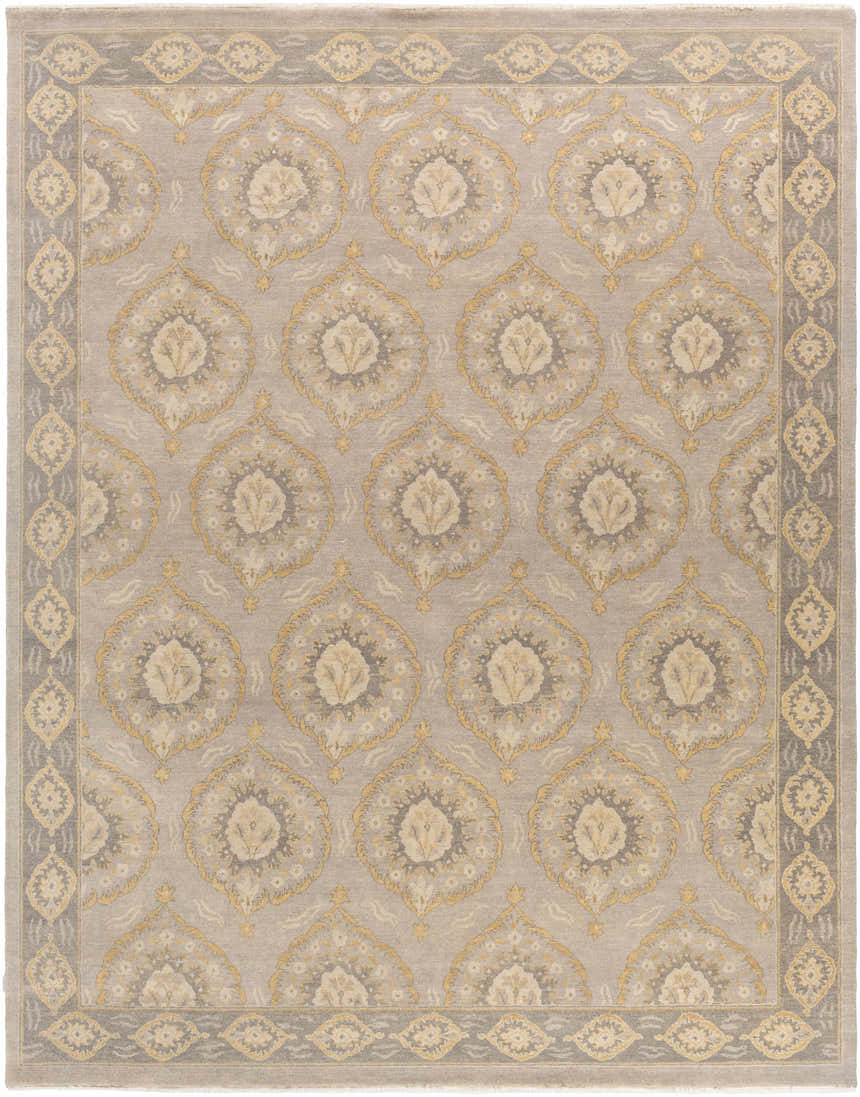 Close-up of the hand-knotted Haleiwa Clearance Rug. Camel, taupe, and dark green floral medallion pattern on 100% wool. Design-Rectangle-810