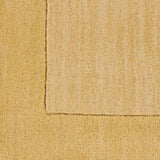 Bordered Solid Camel Yellow Wool Rug