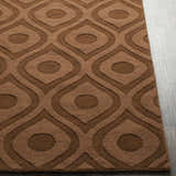 Close-up of the dark brown Hamptonville Area Rug showing its geometric, oval pattern and wool texture. Front