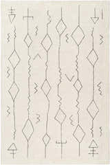 Close-up of the Hanny Area Rug. Beige wool rug with a geometric diamond and line pattern. Hand-tufted texture. Design-Rectangle-576
